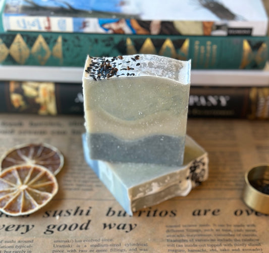 A side view of two bars of Blnded Bliss Cedarwood Lemon Patchouli Soap